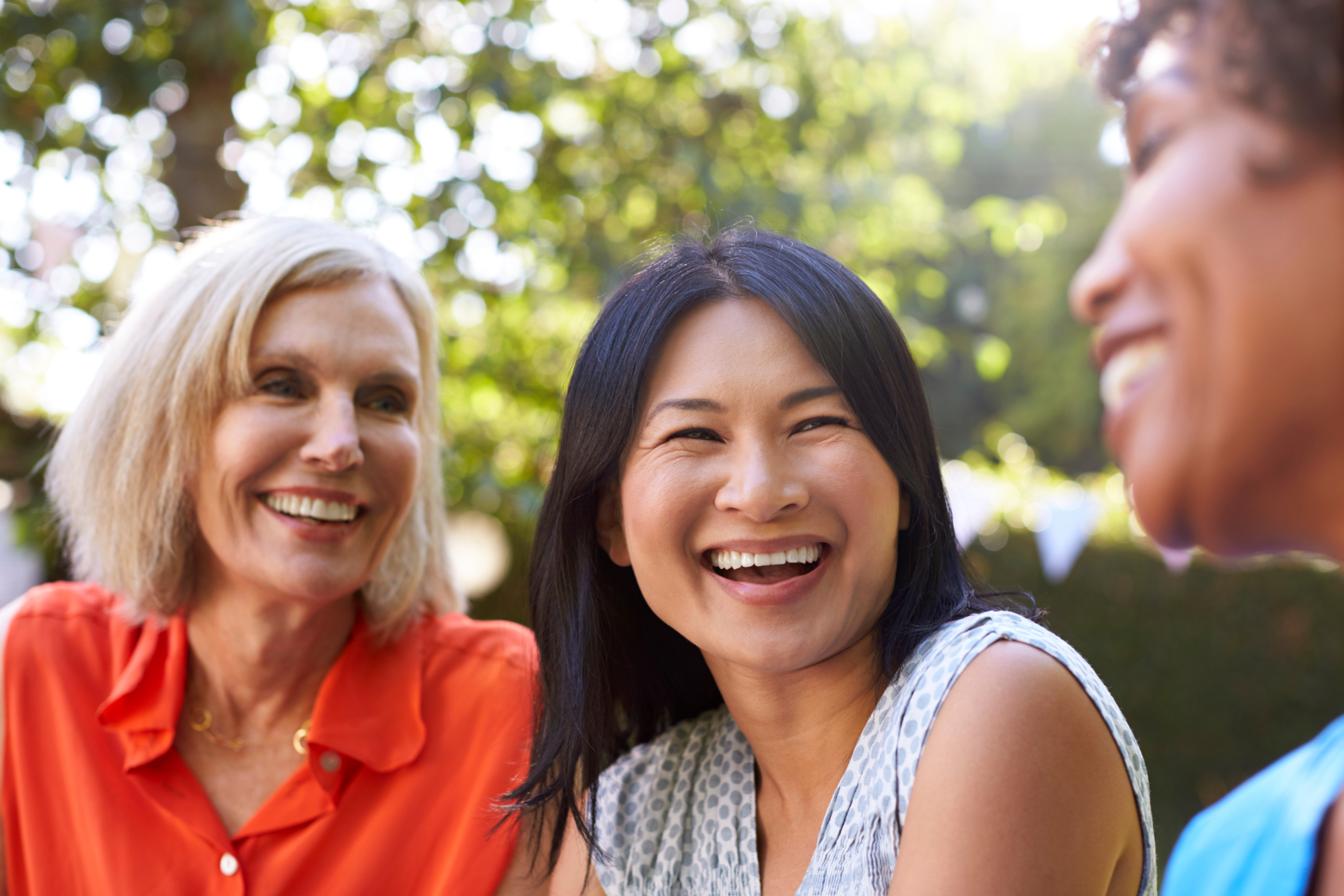 three-women-smiling_137363441